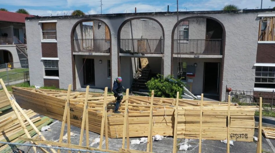 Structural reroofing renovation of an occupied apartment community by Cmax GC